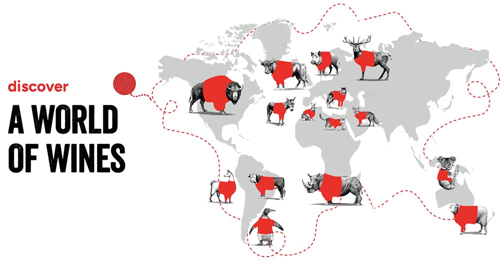 Banner reading 'discover A WORLD OF WINES' beside a world map with red-robed animals and a red dotted route along the continents.